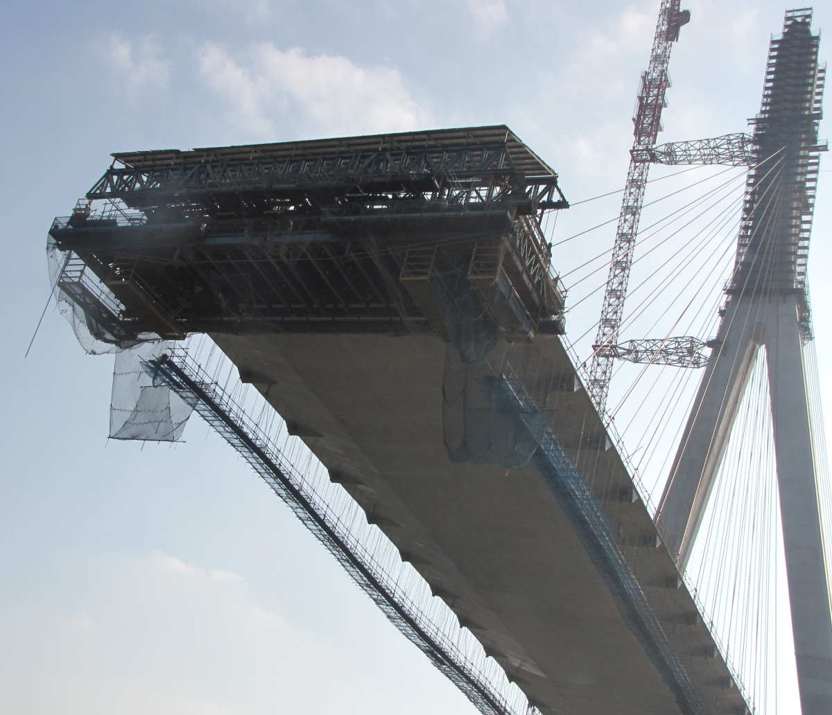 Bridge structure during construction with temporary supports and concrete work