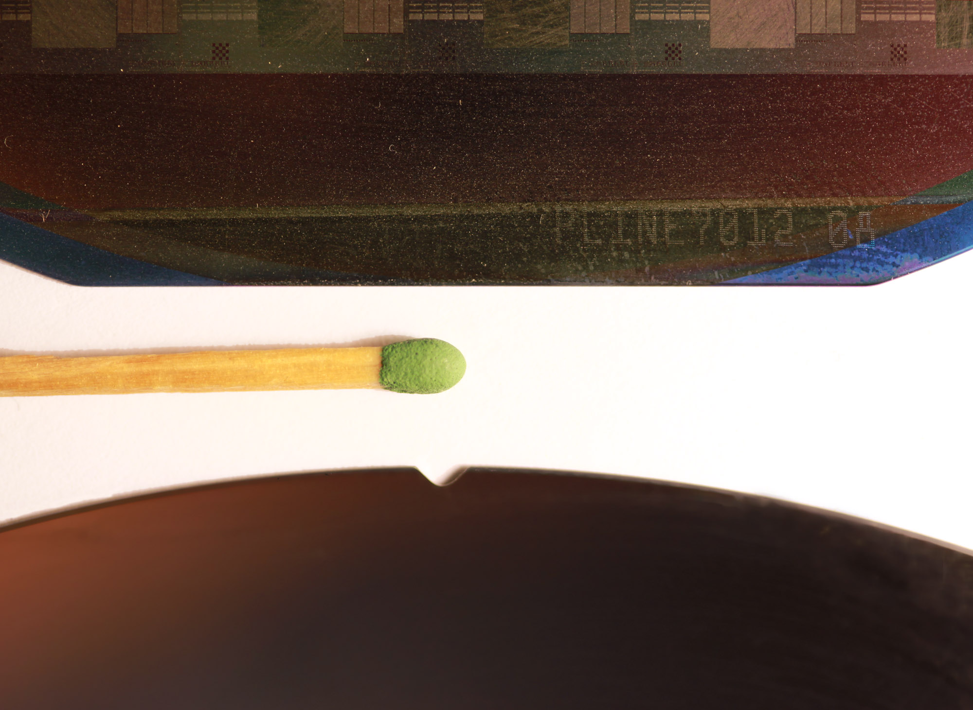 Close views of the flat and notch used to orient silicon semiconductor wafers