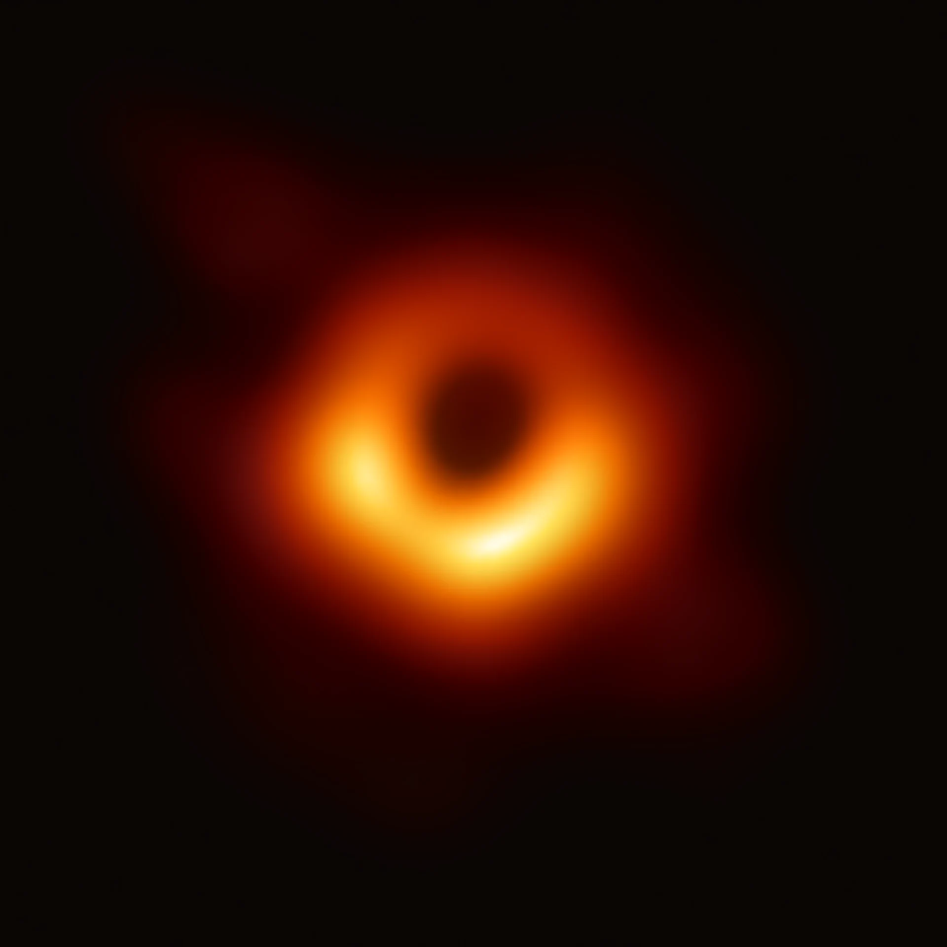 An orange ring of millimeter emission surrounds the dark central shadow of M87’s black hole.